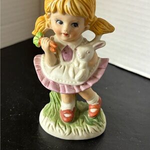 Vintage Homco porcelain figurine of a girl with a bunny & carrots pre-owned